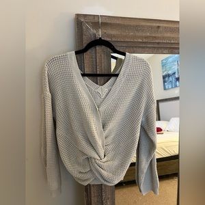 Cotton Candy LA knit sweater. Tied detailing in front. Size M/L.